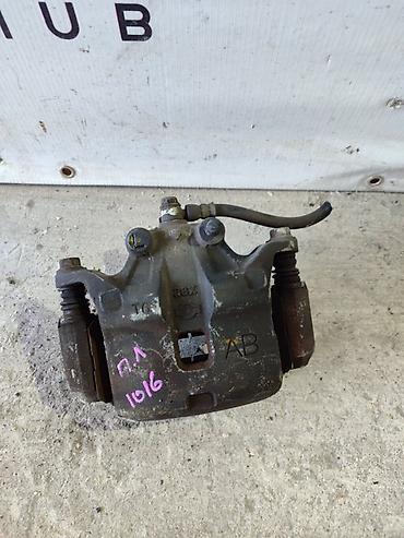 супорт нива: Передний левый суппорт Nissan 2003 г., Б/у, Оригинал, Япония — 1