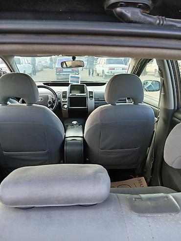 Toyota: Toyota Prius – hibrid hetçbek - Rəng: tünd boz (metallik) - Kuzov: 5 — 8