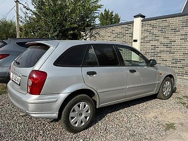 mk 1: Mazda 323: 2002 г., 1.6 л, Механика, Бензин, Хэтчбэк — 5