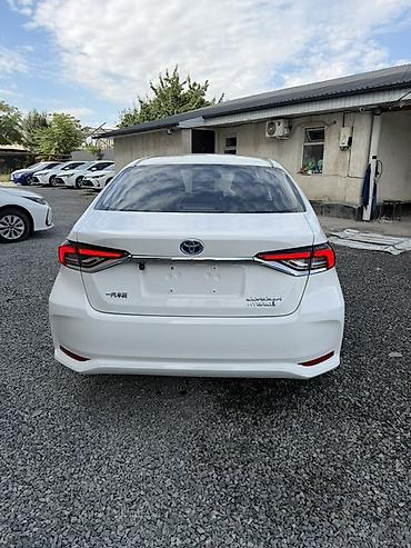 corolla 2004: Toyota Corolla: 2022 г., 1.8 л, Гибрид, Седан — 6