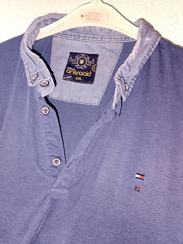 Majice: Muške polo majice – 2 komada Svaka majca po 600dinara 1) Infinity Man — 4