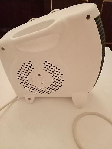 qizdirci: Elektrikli fan qızdırıcılar – kompakt və effektiv istilik həlli 1) — 3