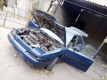 Скупка авто: Mazda 323F, хэтчбек 5 дв., темно‑синий цвет, на разбор. - Кузов: 323F — 9