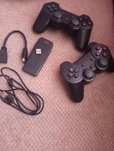 Game Stick Lite — компактная ретро‑приставка в формате HDMI‑стика с