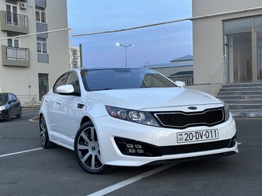 Kia: Kia Optima – ağ rəngli, zərif sedan Xarici xüsusiyyətlər: - Aqressiv — 15