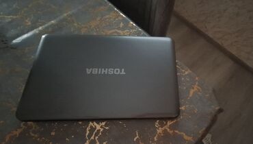 notebook çanta: Toshiba notbuk islək veziyyetde.cantasimiskasi,adapteri var.200