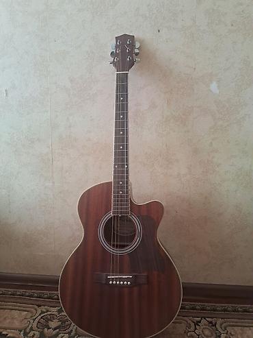 gitara akustik: Akuastik gitara – kəsimli (cutaway) korpusa malik 6 simli model — 1