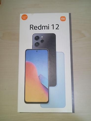 купить сяоми 12: Redmi 12, 128 ГБ, цвет - Черный, Кредит — 5