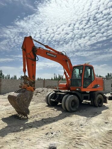 Прицепы и полуприцепы: Экскаватор, Doosan, 2009 г., Колесный