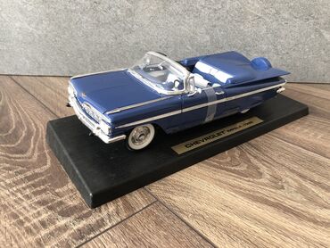 1 dollar 1988: Chevrolet impala 1959 model .
Road legends 1:18