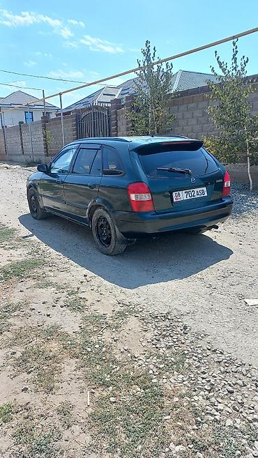mazda d: Mazda Familia: 2002 г., 1.5 л, Механика, Бензин, Универсал — 5