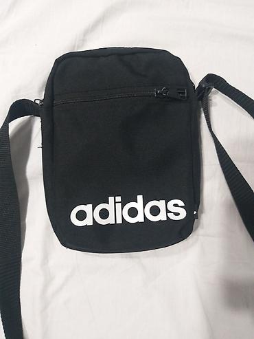 Sportske torbe i rančevi: Adidas uniseks torbica preko ramena – klasičan crni model sa belim — 1
