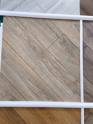 Laminat döşəmə panelləri – taxta fakturalı dekorlar - Material at lalafo.az Laminat döşəmə panelləri – taxta fakturalı dekorlar - Material