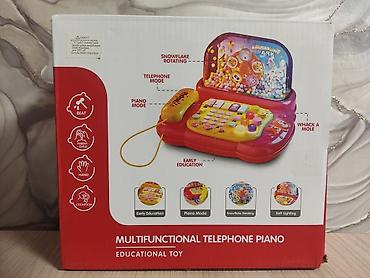 ре: Развивающая игрушка “Multifunctional Telephone Piano” - — 3