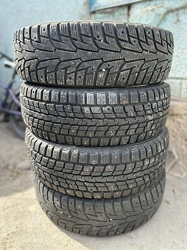 Шиналар жана дисктер: Шины зимние шипованные Dunlop, комплект из 4 шт. - Производитель — 2