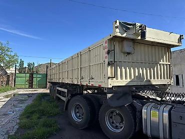 Полуприцеп‑самосвальный бортовой (зерновоз/сыпучие грузы) Описание: -