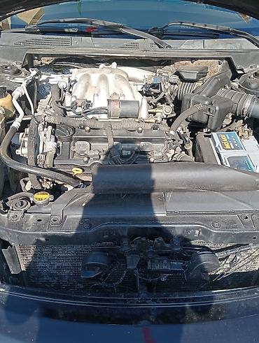 Транспорт: Nissan Teana – qara rəngli, geniş və komfortlu sedan. Xüsusiyyətlər — 9