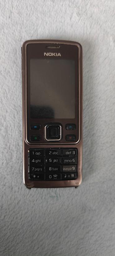 nokia 302: Nokia < 2 GB Memory Capacity, rəng - Qızılı, Düyməli — 1