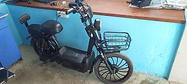 velisoped: Elektrik moped/skuter - Şassi və dizayn: Qara rəngli, yığcam gövdə; — 1