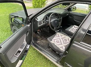 Транспорт: Daewoo Nexia: 2009 г., 1.6 л, Механика, Бензин, Седан — 5