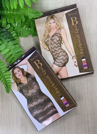 женские белые кофты: Элегантный женский бодистокинг с ажурным узором и вырезами