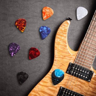 Digər ləvazimatlar: Musiqi alətləri üçün ləvazimatlar Simlərgitara simikabel,udarnik — 16