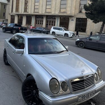Mercedes-Benz: Mercedes-Benz E‑Class (W210) sedan Xüsusiyyətlər: - Korpus: 4 qapılı — 2