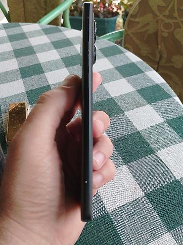 mini pegla za putovanja: Motorola pametni telefon – serija Edge (model sa ispupčenim modulom — 7