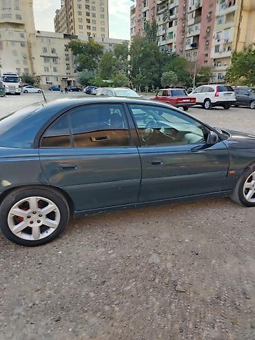 фольксваген поло л с: Opel Omega B sedan - Kuzov: 4 qapılı sedan, tünd yaşıl rəng - — 2