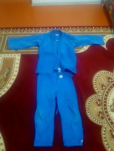 ortopedik ayaqqabi: Məhsul: Uşaq üçün mavi cüdo gi dəsti - Komplekt: üst (kimono) və — 1