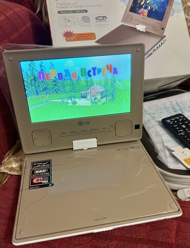 медиа плеер: Продам фирменный DVD LG dp561 новый в коробке с зарядкой в сеть с