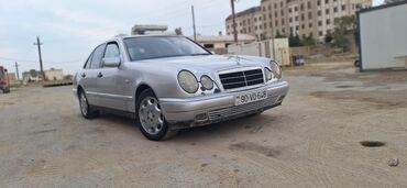 Mercedes-Benz: Mercedes-Benz E 230: 2.3 l | 1995 il Sedan