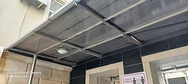 dam örtü: Polikarbonat səthli, metal karkaslı giriş örtüyü və ya səhnik (naves) — 1