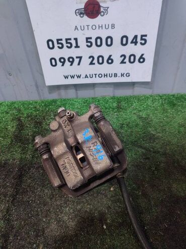 Другие автозапчасти: Суппорт TOYOTA Estima MCR30W 1MZFE 2003 задн. прав. (б/у)