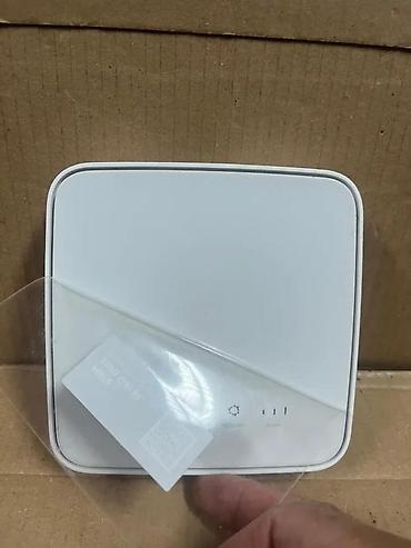 Modemi, ruteri i mrežni uređaji: 4G/LTE kućni ruter – Alcatel HH40V (Congstar HomeSpot) Ključne — 3