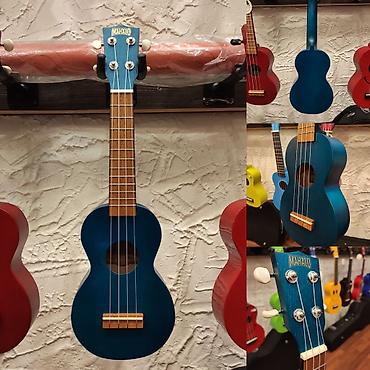 ukulele: Ukulele Mahalo MK1TBU Simlərin sayı: 4 Üst:Sengon Qol: Mahogany Çanta — 1
