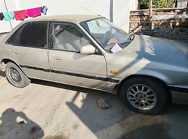 руль марк 2: Mazda 626: 1991 г., Механика, Бензин — 4
