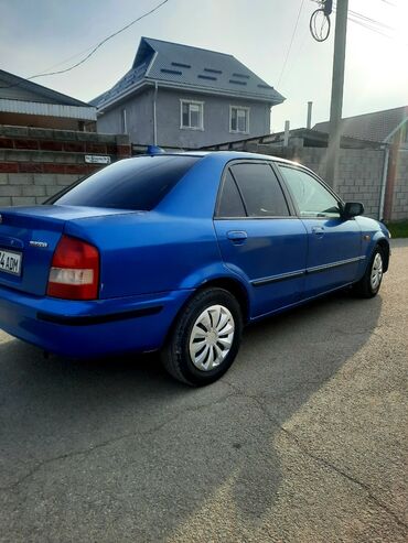 Mazda: Mazda 323: 1998 г., 1.6 л, Механика, Бензин, Седан