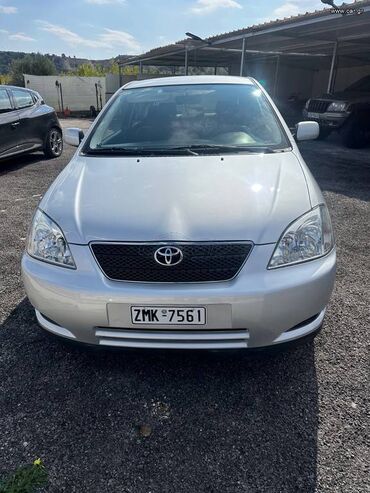 Toyota: Toyota Corolla: 1.6 l. | 2004 έ. Χάτσμπακ