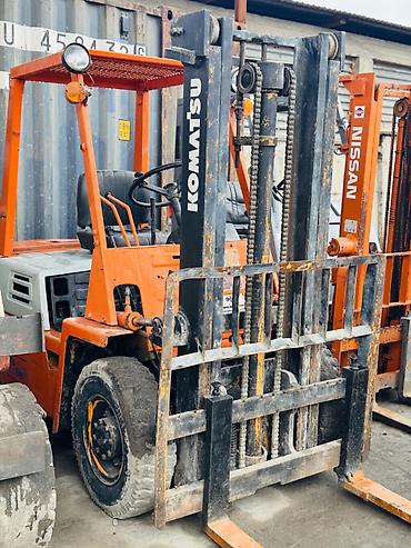 2003: Погрузчик, Komatsu, 2003 г., Колесный, Вилочный — 1