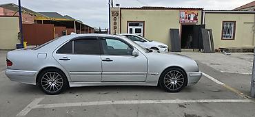 lexus ct 200: Mercedes-Benz E 320: 3.2 l | 2001 il Sedan — 6