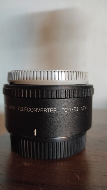 Объективы и фильтры: Продаю телеконвертер Nikon ТС17II x1.7, новый, цена 200 USD