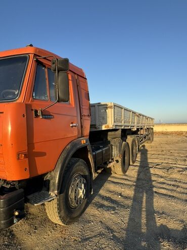 Yük maşınları: KAMAZ yük maşını – narıncı kabinalı, arxada dumper/kuzov tipli daşınma — 7