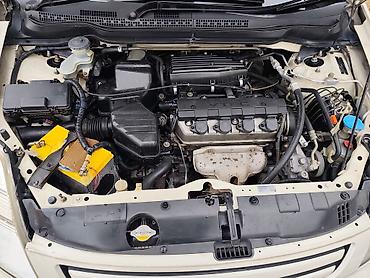 отделка салона авто: Honda Stream: 2003 г., 1.7 л, Минивэн — 10