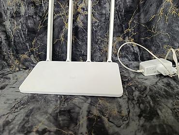 iphone 13 pro max irshad: Xiaomi Mi Router 3C Wi‑Fi routeri Xüsusiyyətlər: - 4 yüksək qazanclı — 2