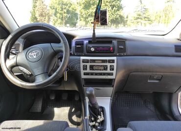 Toyota Corolla: 1.4 l | 2004 year Hatchback
