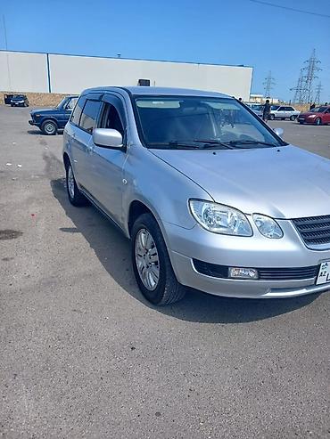 Mitsubishi: Mitsubishi Airtrek, gümüşü rəng, 5 qapılı krossover/gəzinti — 4