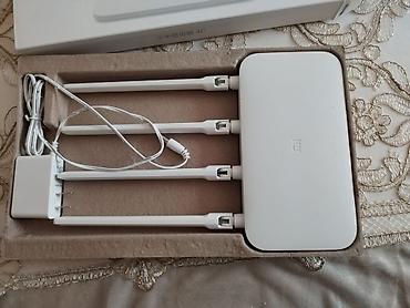 mi printer: Məhsul: Xiaomi Mi Router 4C (R4CM) Xüsusiyyətlər: - 2.4 GHz Wi‑Fi — 2
