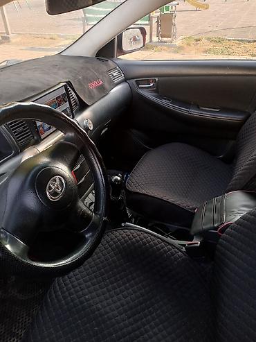 Унаа: Toyota Corolla: 2004 г., 1.8 л, Кол менен иштөөчү, Бензин, Хетчбек — 6