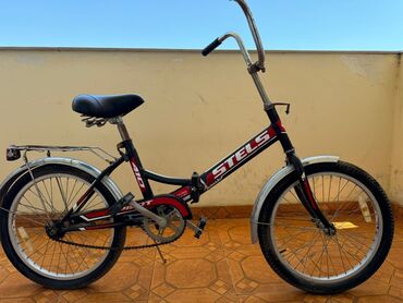 mingecevirde velosiped satisi: İşlənmiş İki təkərli Uşaq velosipedi Stels, 20", Ünvandan götürmə